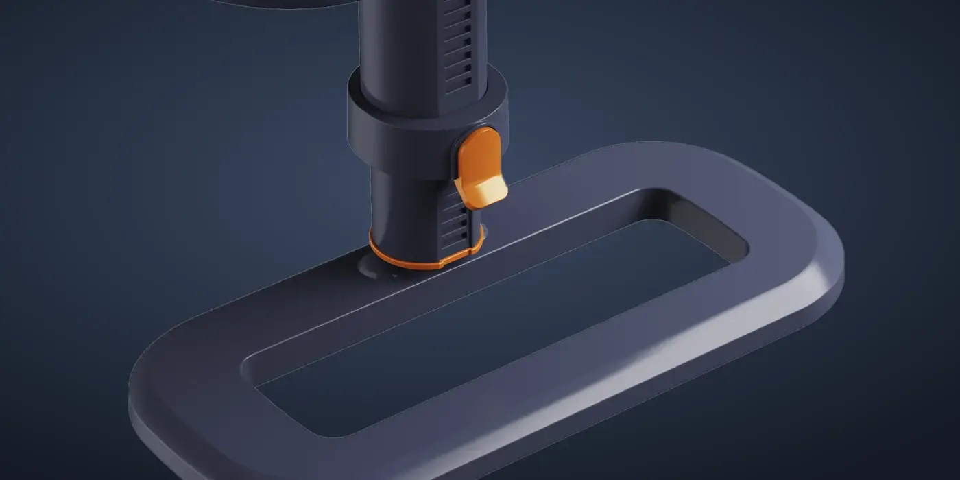 Detail základny podnožky s oranžovým kroužkem a západkou